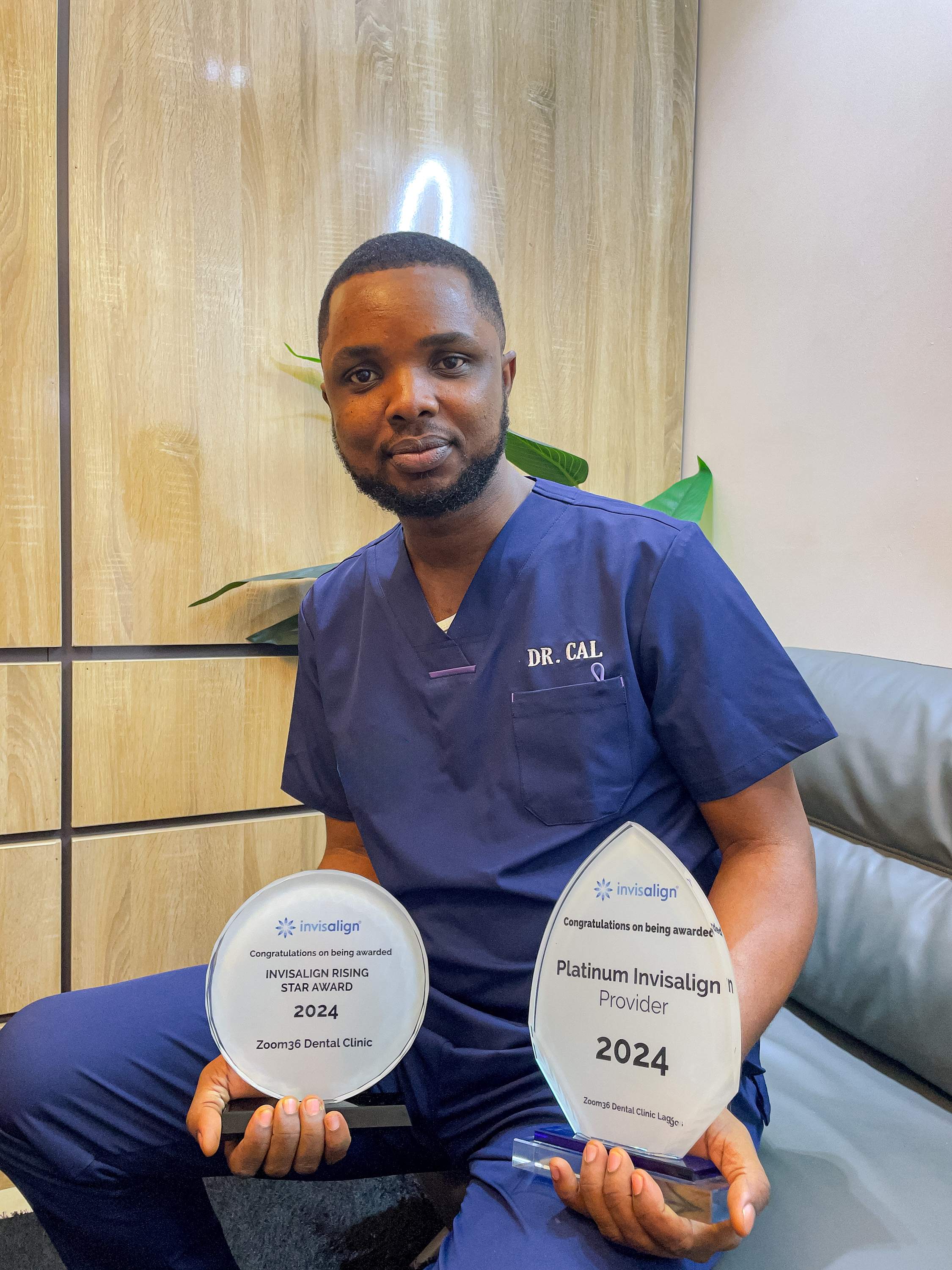 dr cal the md of zoom exclusive dental care showing his awards-2